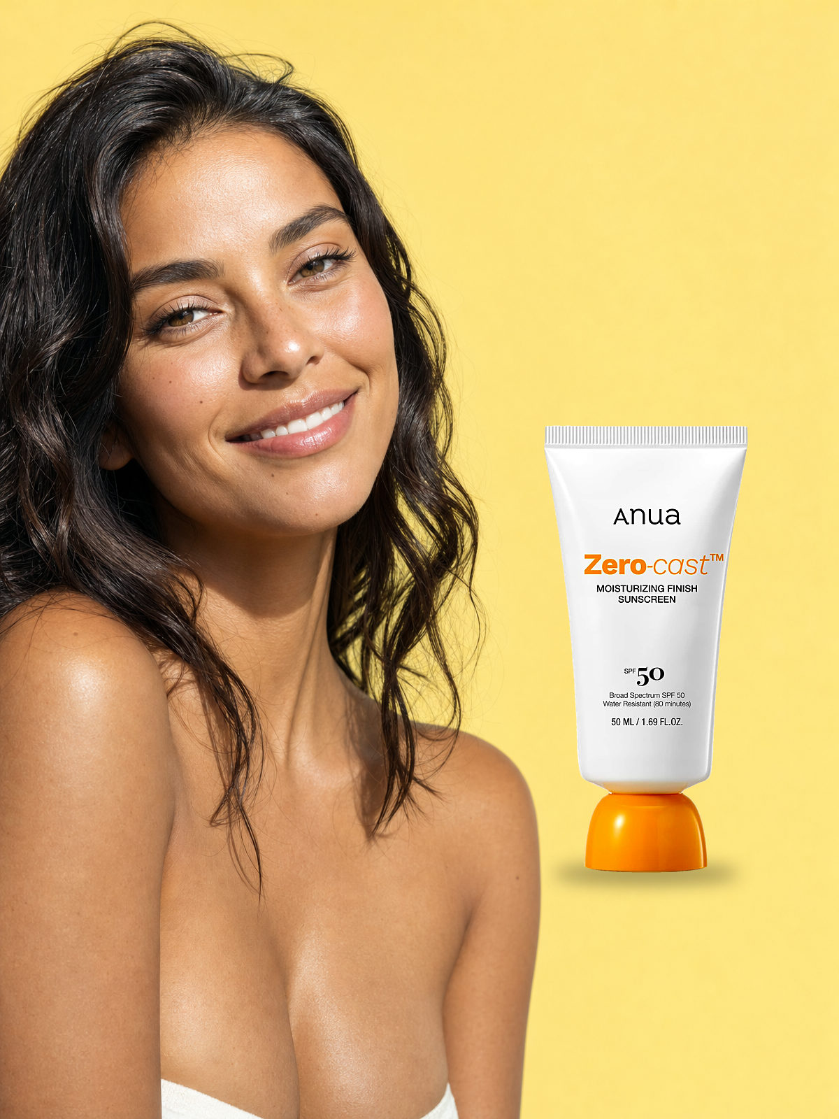 A smiling woman in bright sunlight next to Anua Zero-Cast Moisturizing Finish Sunscreen