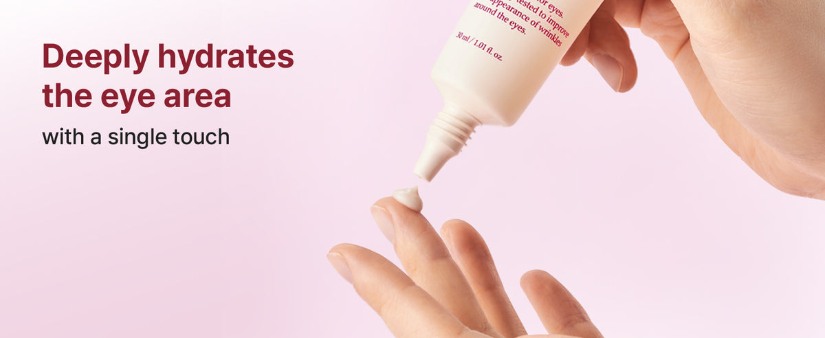 I'm From Ginseng Eye Cream squeezed from the tube onto a fingertip
