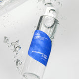 Isntree Hyaluronic Acid Toner 200ml clear bottle with blue leaf label floating among water bubbles