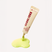 K-Secret Seoul 1988 Advanced Shot Retinal Liposome 12% + Black Rice 15ml tube with a pool of yellow-green cream