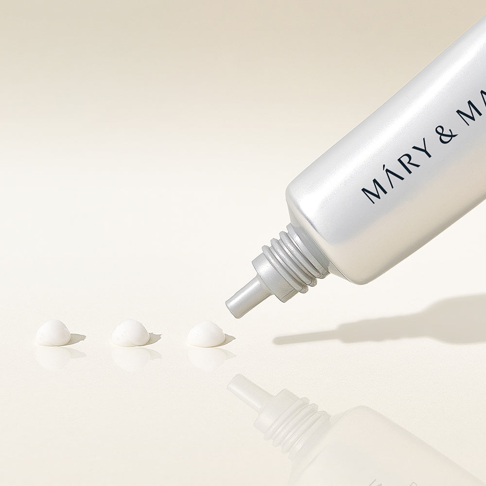 Mary&May Tranexamic Acid + Glutathione Eye Cream nozzle tip with three dots of white cream
