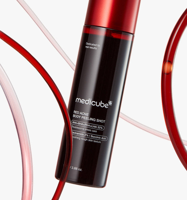 Medicube Red Acne Body Peeling Shot bottle label close-up with red ribbons