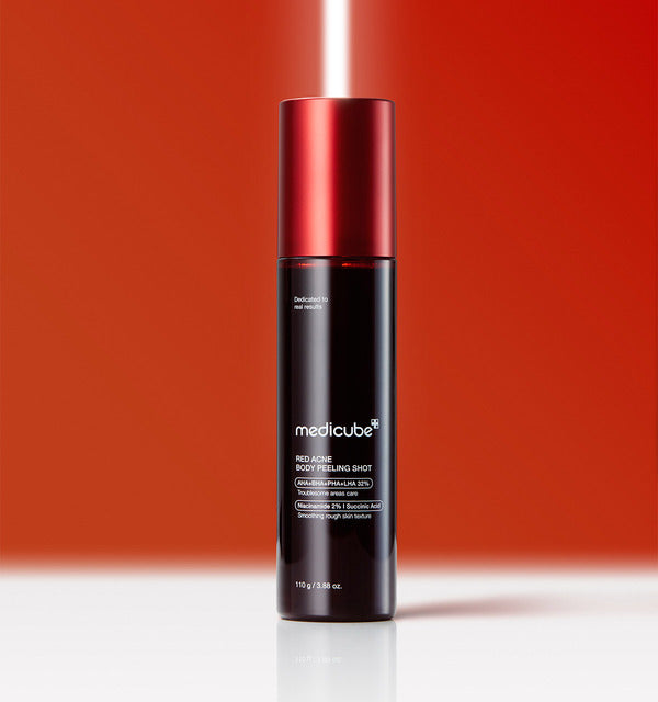 Medicube Red Acne Body Peeling Shot bottle on a bold red background