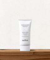 Melixir Airfit Invisible Sunscreen SPF 50 50ml white tube on a light shelf