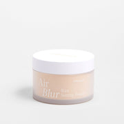 Milk Touch Air Blur Rice Setting Powder 33g in a frosted jar with white lid