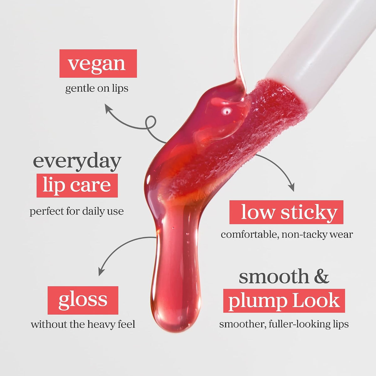 Nooni Lip Oil glossy red oil texture dripping from the doe-foot applicator with vegan and low-sticky notes