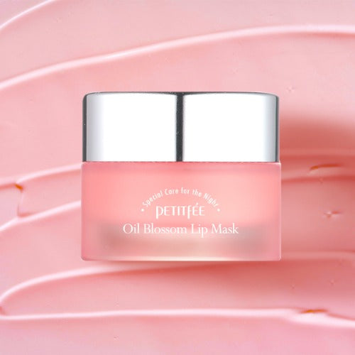 Petitfee Oil Blossom Lip Mask Camellia Seed Oil jar over a swirled pink balm texture