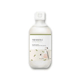 Round Lab Soybean Nourishing Toner 300ml milky bottle with beige illustrated label on white