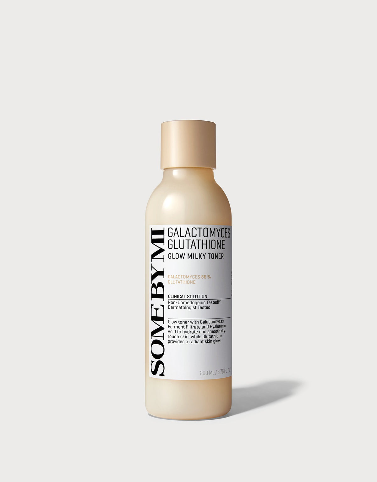 Some By Mi Galactomyces Glutathione Glow Milky Toner 200 ml beige bottle on a light grey background
