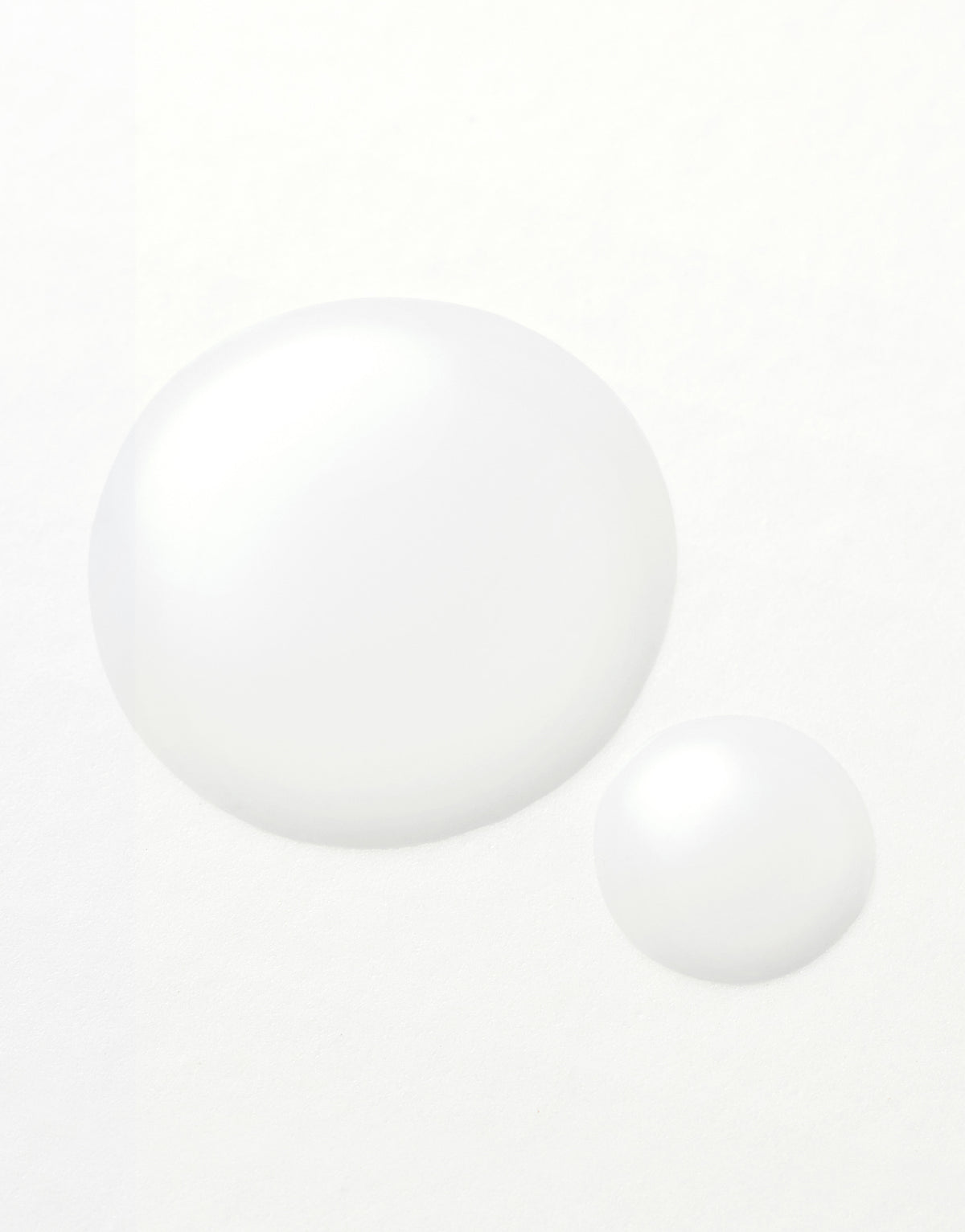 Some By Mi Galactomyces Glutathione Glow Milky Toner texture, two drops of the milky white toner