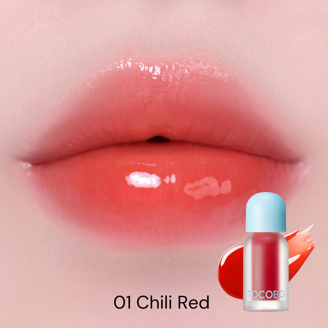 Tocobo Juicy Berry Plumping Lip Oil 01 Chili Red swatched on lips with a glossy red finish