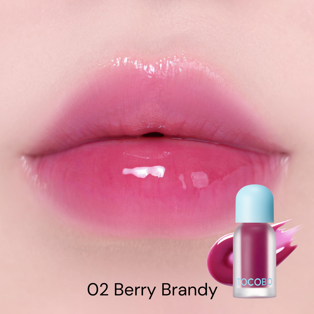 Tocobo Juicy Berry Plumping Lip Oil 02 Berry Brandy swatched on lips with a glossy berry finish
