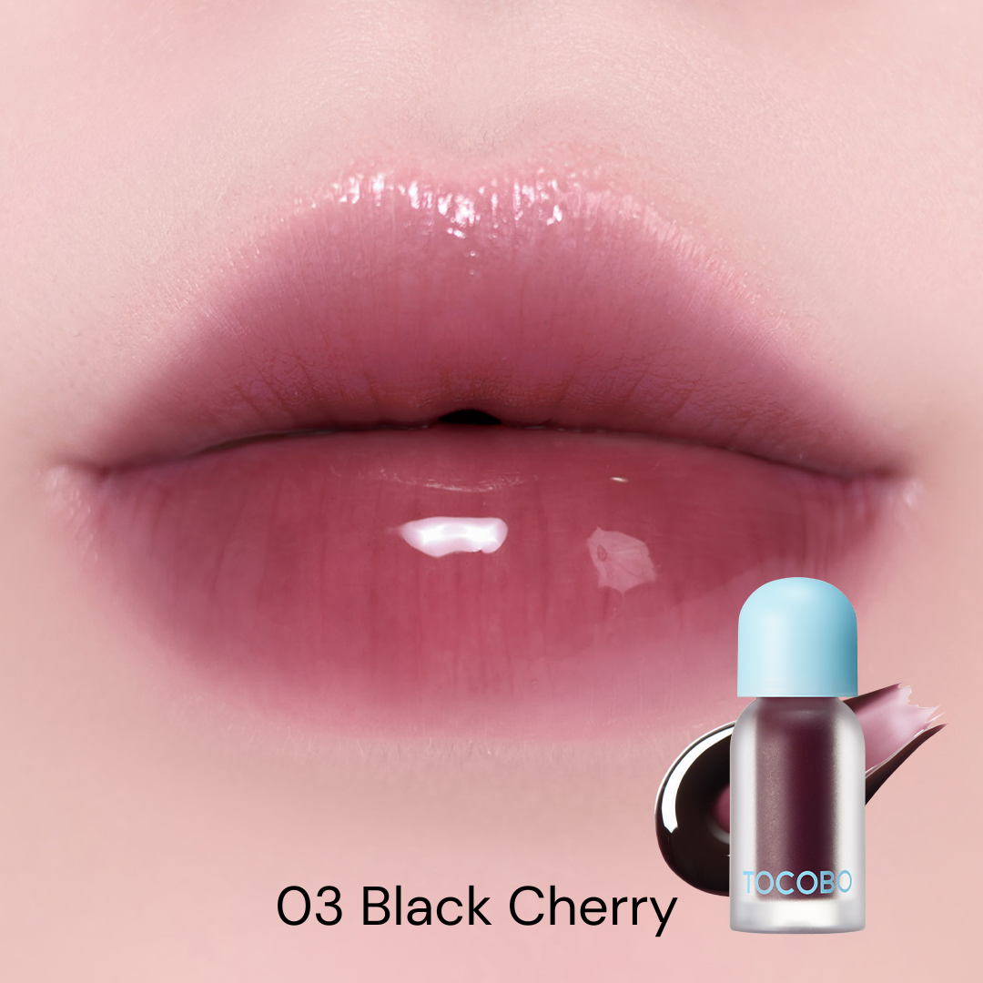 Tocobo Juicy Berry Plumping Lip Oil 03 Black Cherry swatched on lips with a sheer plum-cherry gloss
