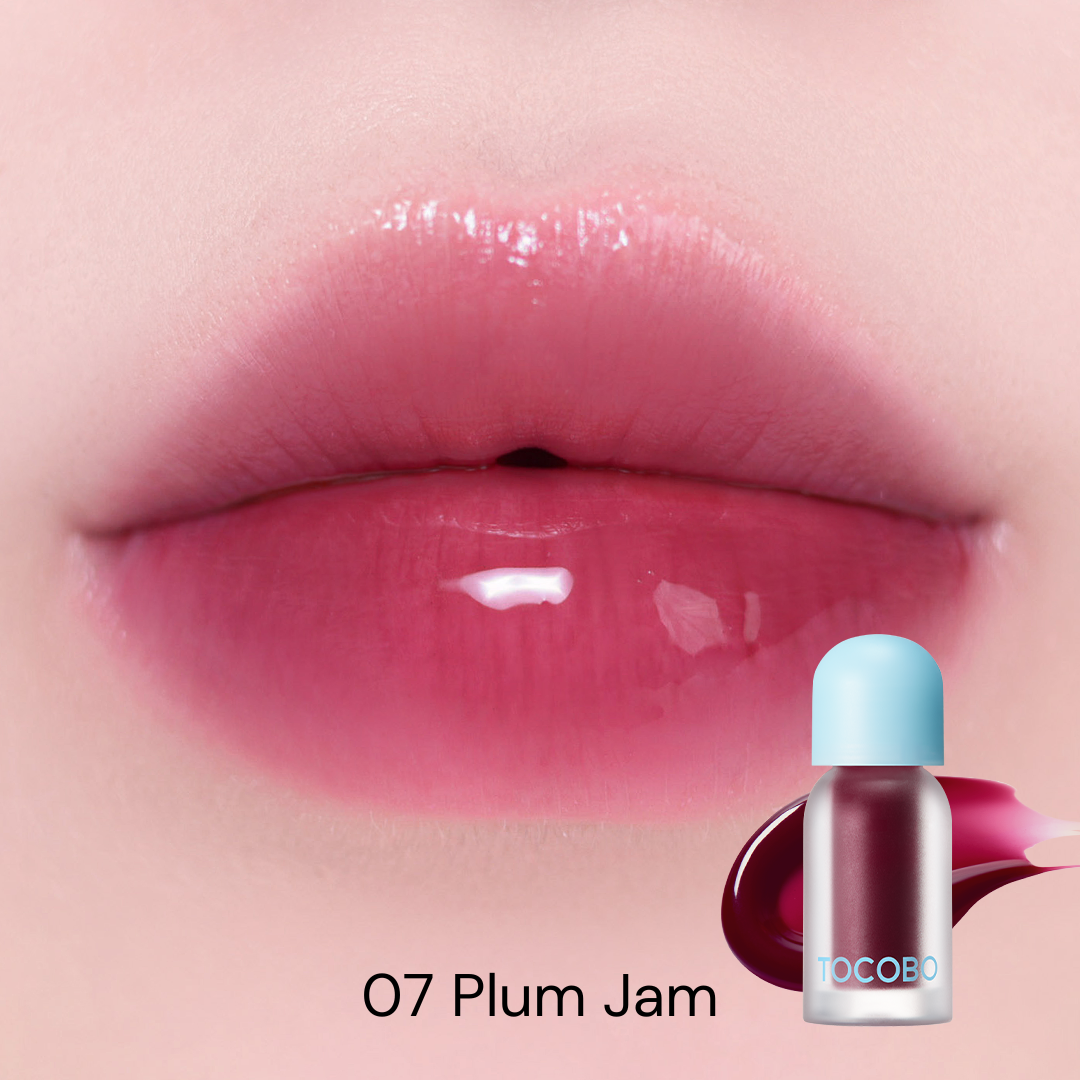 Tocobo Juicy Berry Plumping Lip Oil 07 Plum Jam swatched on lips with a glossy plum finish