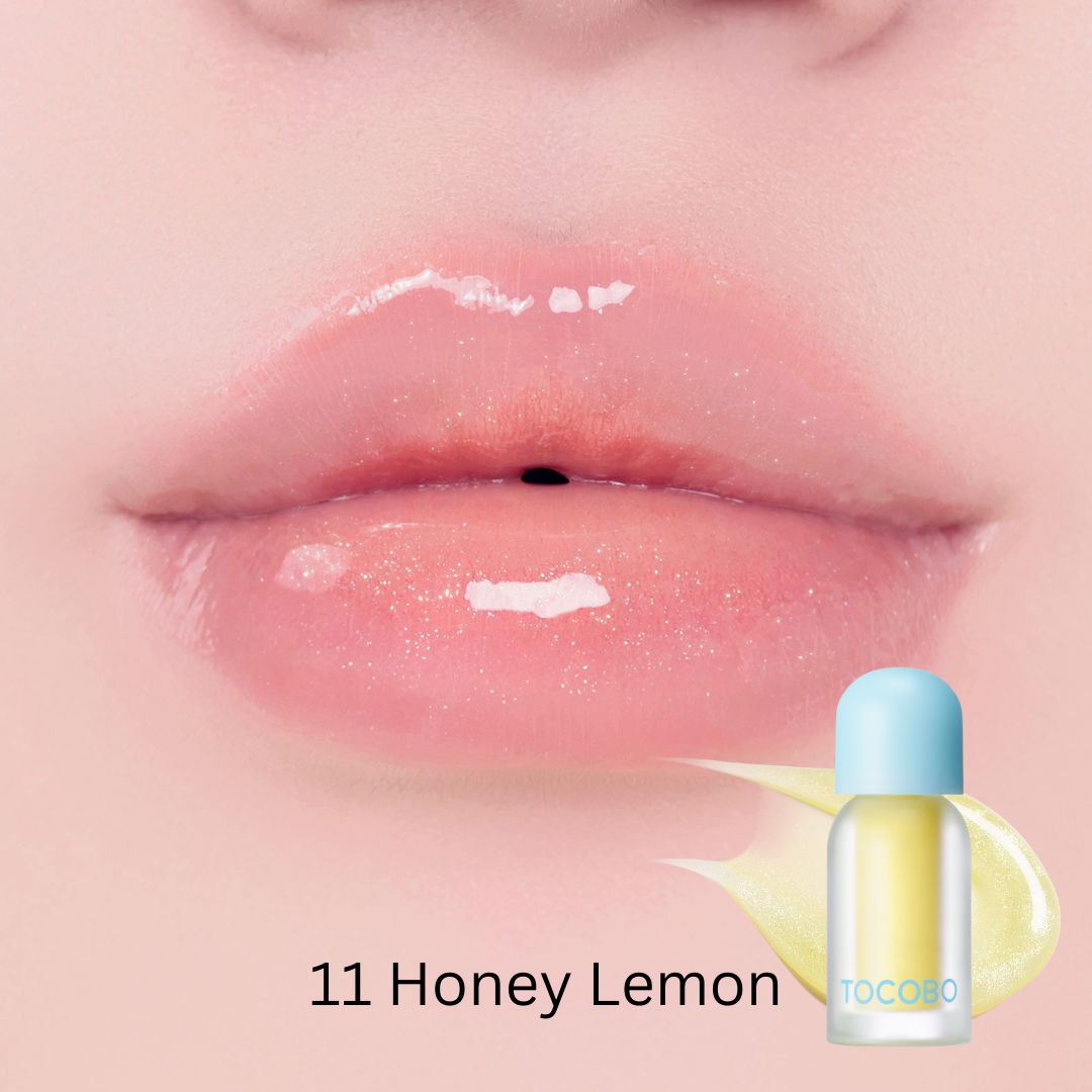 Tocobo Juicy Berry Plumping Lip Oil 11 Honey Lemon on lips with a sheer glossy shine